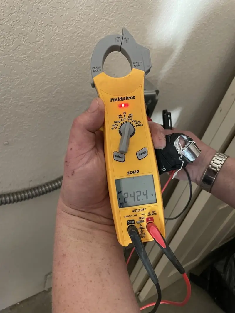 Voltage testing with clamp meter during Hot Tub / Pool Electrical Wiring in Macomb